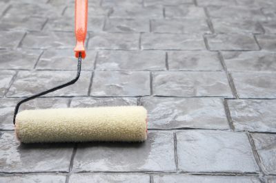 Why Cleaning And Sealing Outdoor Surfaces Extends Their Lifespan